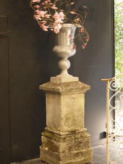 Stone column topped with a vase