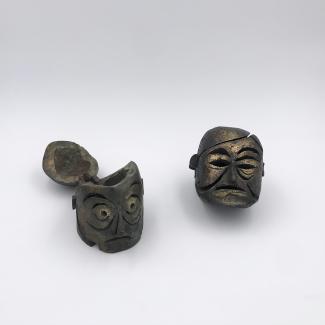 Two bronze heads by Michel Andrault
