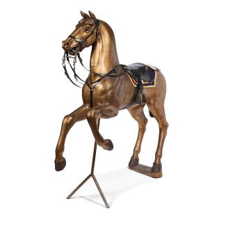 Harnessed golden wooden horse