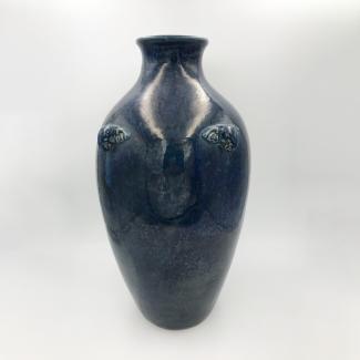Vase in glazed earthenware with elephants