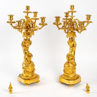 Pair of candelabras with Putti by Claude Galle