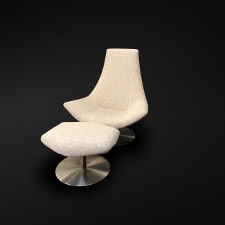 Design armchair in fabric and its Ottoman