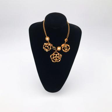 Necklace with 3 Chanel symbols