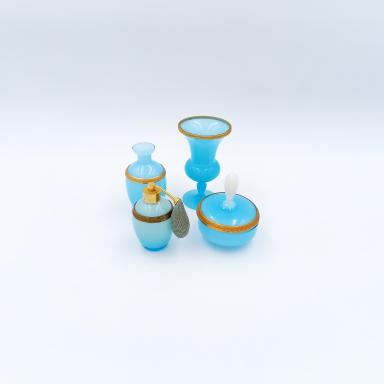set of 4 objects in Opaline