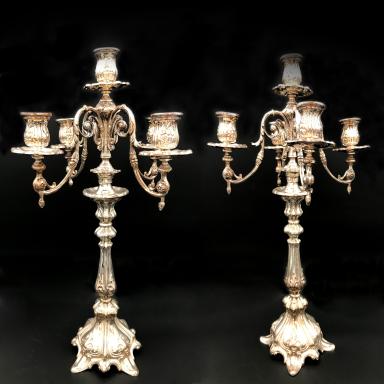 Pair of candelabras in silver plated metal