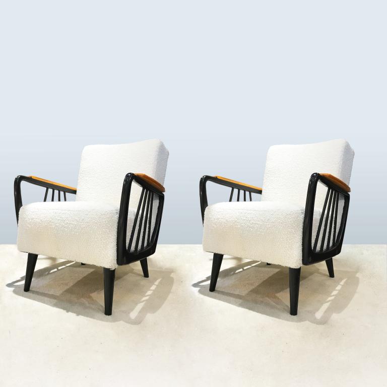 A pair of Italian design armchairs with lemon tree arms