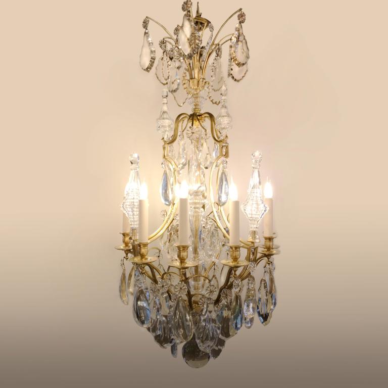 Large bronze and crystal chandelier with central stem