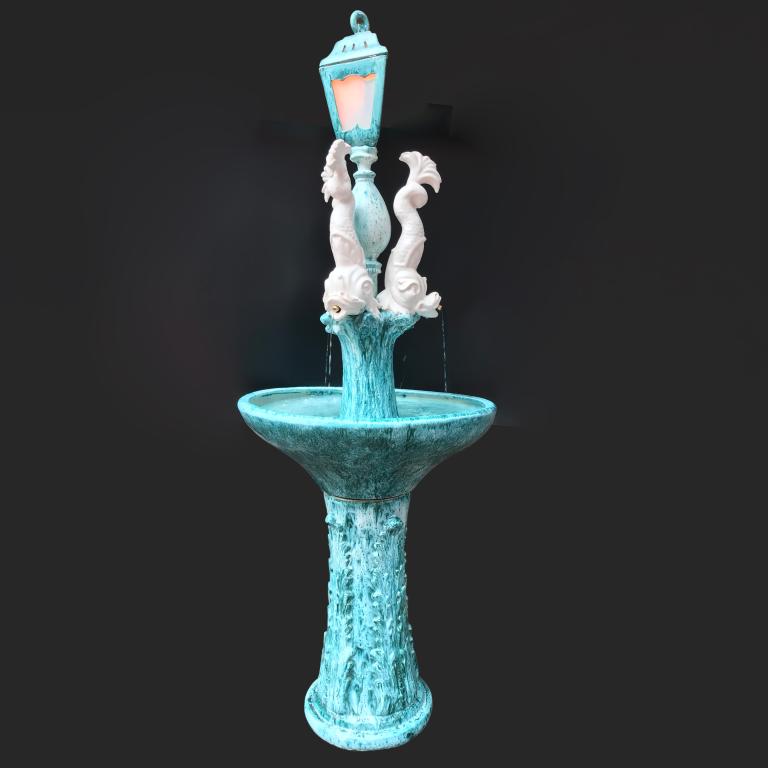 Fountain with three dolphins in glazed ceramic