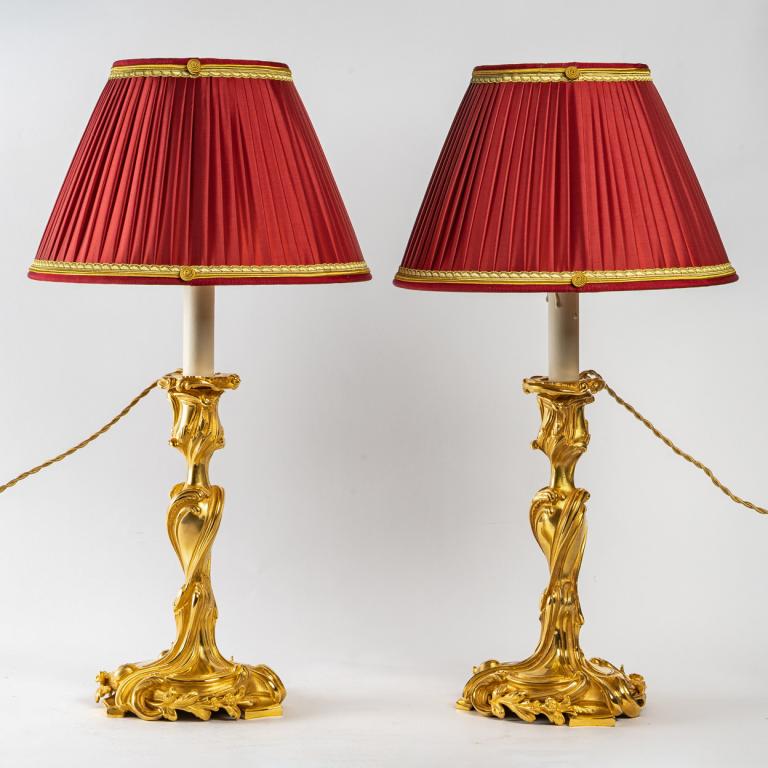 Pair of large French Regence style candlesticks in finely chiseled gilt bronze converted as table-lamps