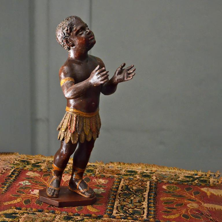 Rare statuette representing a black child, 18th century, front