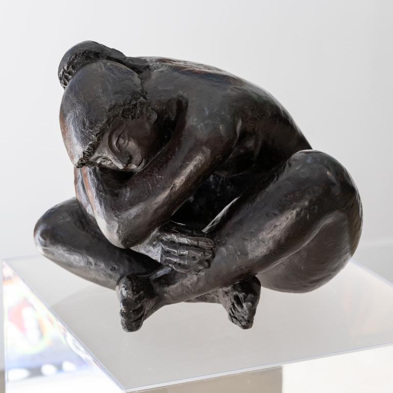 Crouching woman, bronze sculpture signed Volti 