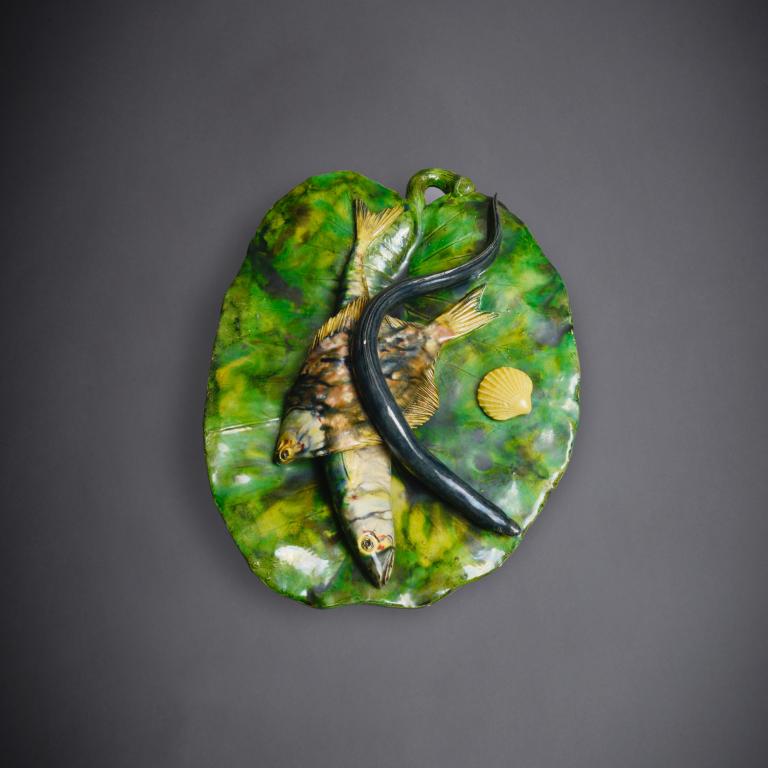 Green leaf with two fishes, an eel by Alfred Renoleau