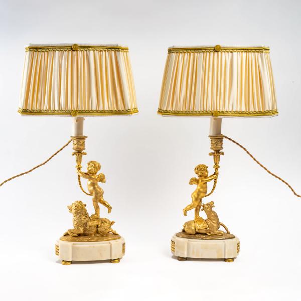 Pair of candlesticks with Putti Hunters in gilt bronze, circa 1850-1880