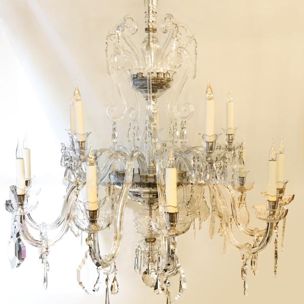 Large crystal chandelier with central shaft
